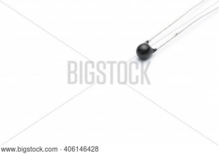 Close-up Shot Of An Electronic Thermistor Isolated On White Background