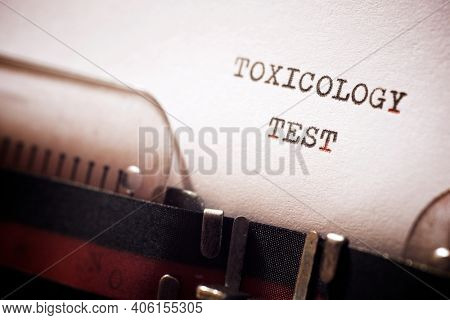 Toxicology test phrase written with a typewriter.