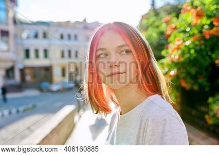 Outdoor Portrait Of Girl 16, 17 Years Old On The Street Of Sunny City, Copy Space. Fashionable Beaut