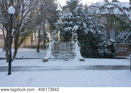 Manor Park In Iłowa In Winter. A Brick Bridge Over The Czerna Mała River.\nthe Town Of Iłowa In West