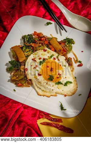 Canned Chinese Food Chop Suey With Fried Sunny Side Up Egg