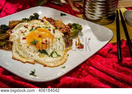 Canned Chinese Food Chop Suey With Fried Sunny Side Up Egg