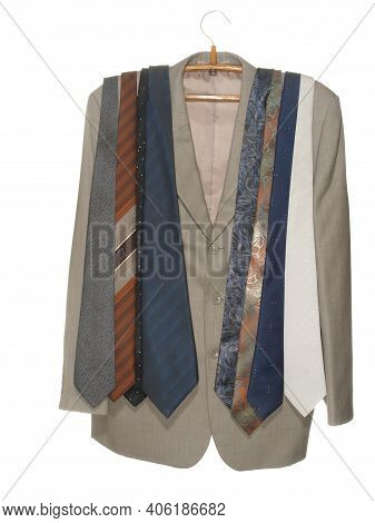 Gray Jacket With Assorted Ties On A Wooden Hanger With A Metal Hook Isolated On A White Background