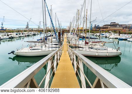ANGLET, FRANCE - CIRCA AUGUST 2020: Sailboats at the Brise-Lames marina on the River Adour estuary.