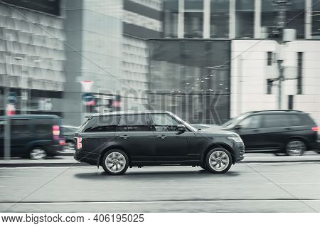 Moscow, Russia - 29 January, 2021: Range Rover L405 Fourth Generation Moving Fast On City Street. Bl