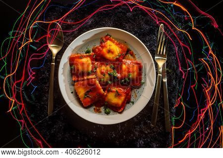 Italian Ravioli With Tomato Sauce Exciting Celebration With Neon Light Trails