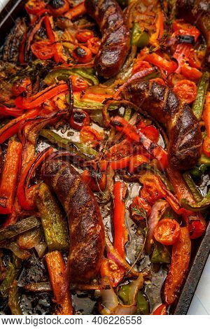 Broiled Sausage Onions And Peppers With Cherry Tomatoes And Thyme