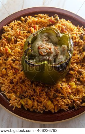 Cheesesteak Stuffed Bell Pepper With Spicy Spanish Pigeon Pea Corn Rice