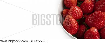 Red Strawberries In White Bowl Isolated Close Up. Ananassa Strawberry In Soup Plate On White Backgro