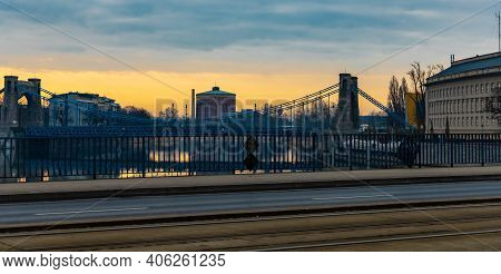 Wroclaw, Poland - March 19 2020 Beautiful Sunrise Over Grunwaldzki Bridge And Peace Bridge Reflected
