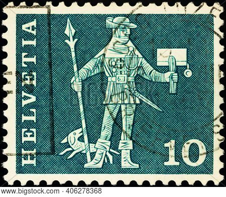 Moscow, Russia - January 30, 2021: Stamp Printed In Switzerland Shows Messenger Of Schwyz (15th Cent