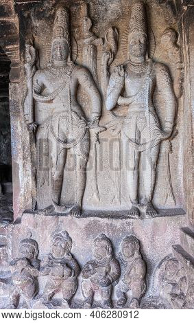 Aihole, Karnataka, India - November 7, 2013: Ravanaphadi Cave Shiva Temple. Closeup Of 2 Gray-stone 