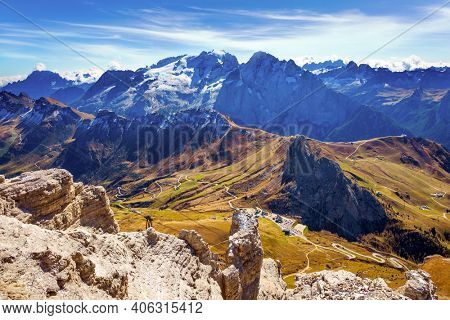 The Dolomites. The Pordoi Pass is part of the Dolomiti Superski ski resort.  Alpine road of South Tyrol. Italy - Austria