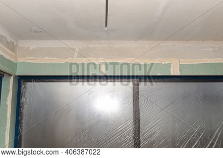 Installation For External Roller Shutters Made Of Plasterboard Inside The Building, Windows Are Cove
