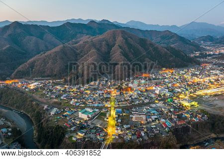 Otsuki, Japan city skyline from above at twilight.