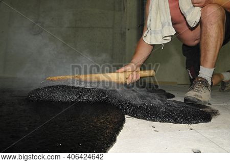 Hot Liquid Mastic Asphalt On The Floor