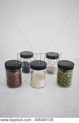 Seed Jars With Sesame Poppy Pupmkin Chia And Flax Seeds As Important Nutrient Sources For Nutrition