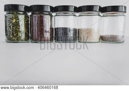 Seed Jars With Sesame Poppy Pupmkin Chia And Flax Seeds As Important Nutrient Sources For Nutrition