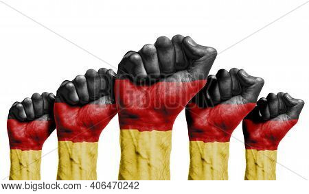 A Raised Fist Of A Protesters Painted With The Germnay Flag