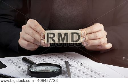 Businesswoman Holding Wooden Block With Text Rmd , Business Concept