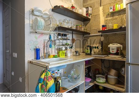 Interior Of A Temporary Habitable Kitchen In An Unrepaired Room
