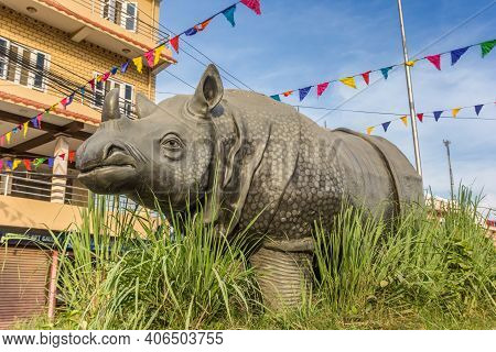Chitwan, Nepal - November 09, 2019: Sculpture Of A Rhinoceros In Main Street Sauraha, Nepal