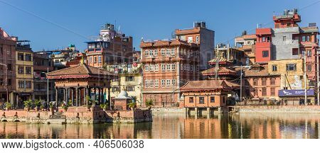 Patan, Nepal - November 15, 2019: Panorama Of Pimbahal Pokhari Krishna Temple And Houses In Patan, N