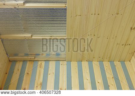 Finishing With Wooden Clapboard Ceiling In The Room Of A Country House