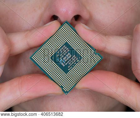 Computer Cpu Chip Over The Mouth, Front View