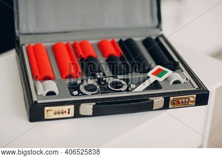Opthalmology Test Box. The Universal Messbrille Tool Of The Optometrist And Oculist. Set Of Dioptric