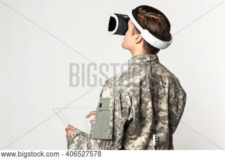 Soldier in VR headset for simulation training military technology