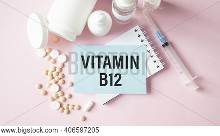 Notebook Page With Text Vitamin B12 On A Table With A Pills And Pencil, Medical Concept, Top View