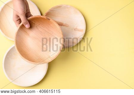 Hand Holding Betal Palm Leaf Plate (biodegradable, Compostable, Disposable Or Eco Friendly Plate) On