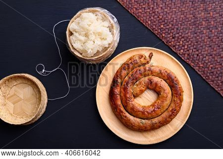Northern Thai Sausage (sai Aua), Grilled Intestine Stuffed With Minced Pork, Spices And Herbs Eating