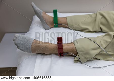 Heart Electrocardiogram Or Monitoring Using Holter For Young Patient. Male Athlete Does A Cardiac St