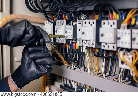 Electrician Engineer Work Tester Measuring Voltage And Current Of Power Electric Line In Electical C