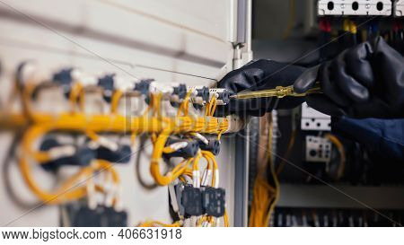 Electrician Engineer Work Tester Measuring Voltage And Current Of Power Electric Line In Electical C