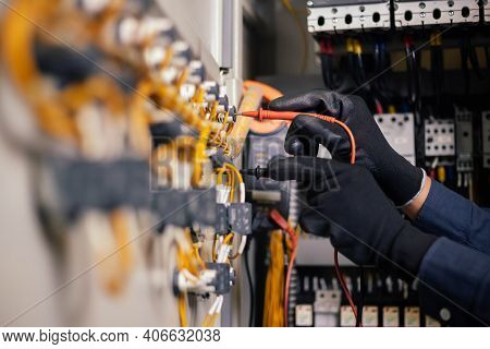 Electrician Engineer Work Tester Measuring Voltage And Current Of Power Electric Line In Electical C
