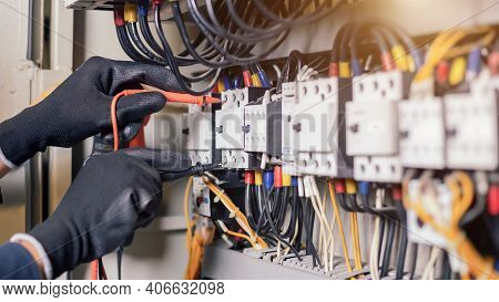 Electrician Engineer Work Tester Measuring Voltage And Current Of Power Electric Line In Electical C