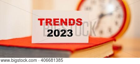 Trends 2023 On An Orange Background. Tops Of Trends For The Next Year.
