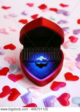 Porposal Box With Diamond Bright Ring In Heart Shaped Box On Light Background Decorated With Pastel 