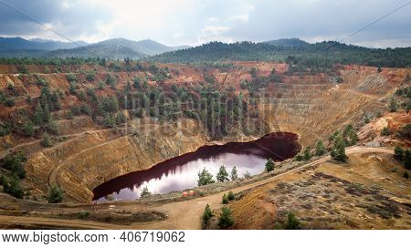 Red Lake In Crater Of Abandoned Kokkinopezoula Open-pit Copper Mine Near Mitsero, Cyprus. Its Odd Co