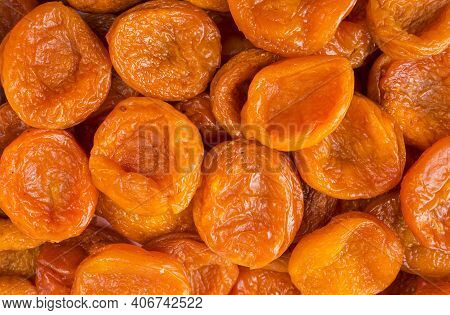 Background Of Dried Apricots. Dried Fruits Of Close Up. Top View. Background Of Dried Fruits. Dried 