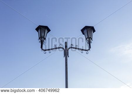 Double Lamp Post In The Town Of Albisano In The Province Of Verona.