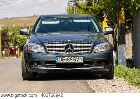 Dirty Mercedes Car Parked Along The Street In Razvad, Romania, 2020