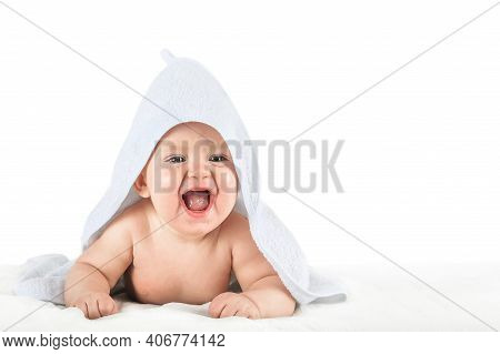 Close-up Child In White Towel Isolated On White Background. Bathing Babies And Restful Sleep. Funny 