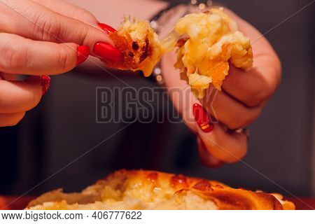 Woman Is Eating Adjarian Khachapuri With Hands, Crushing Egg Yolk.