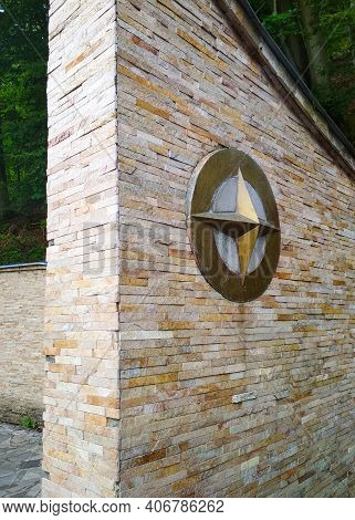 Monument Of The Middle Of Europe With A Compass. In The Highlands Of Transcarpathia Ukraine