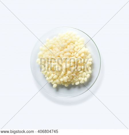 Candelilla Wax Sp-75. Chemical Ingredient For Cosmetics And Toiletries Product On White Laboratory T