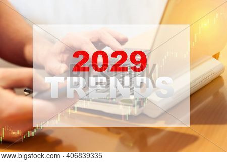 A Man Studies Trends In The Early Morning For 2029
